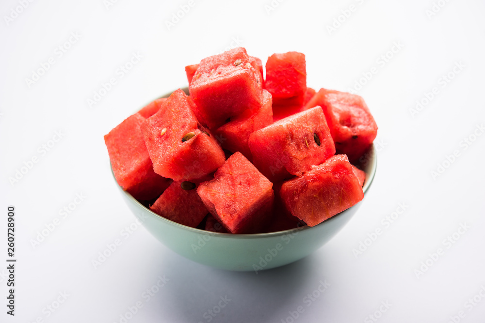 Watermelon / tarbooj fruit cube slices served in a bowl. selective focus Watermelon / tarbooj fruit cube slices served in a bowl. selective focus