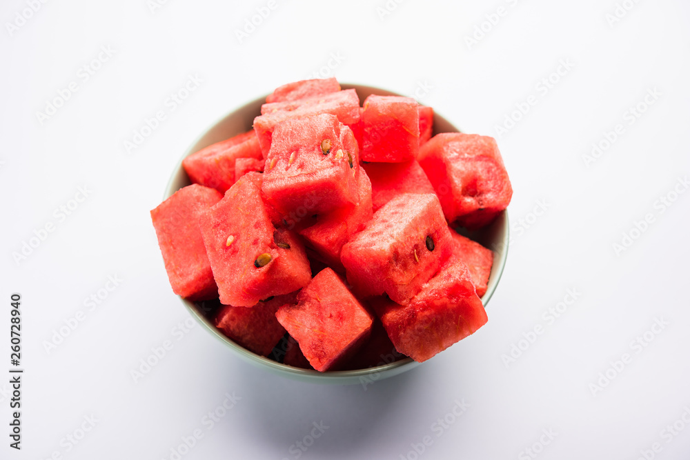 Watermelon / tarbooj fruit cube slices served in a bowl. selective focus Watermelon / tarbooj fruit cube slices served in a bowl. selective focus
