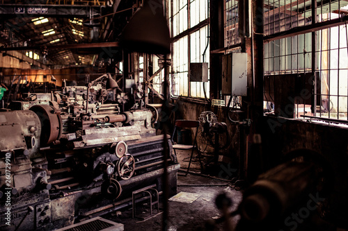 Old steel factory. Retro photography. Old factory industry. Photography. Metal pipes. Dark interior of large halls for production or warehouses.soft focus.