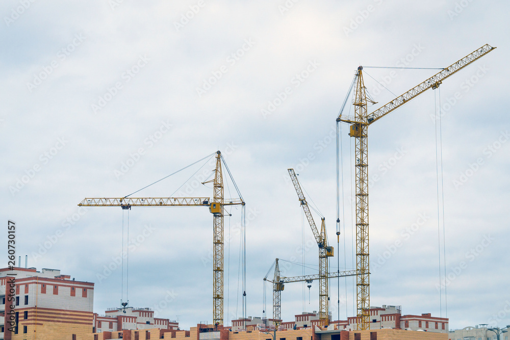 construction cranes construction of houses construction cranes construction of houses