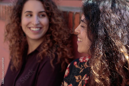 two friends laughing together