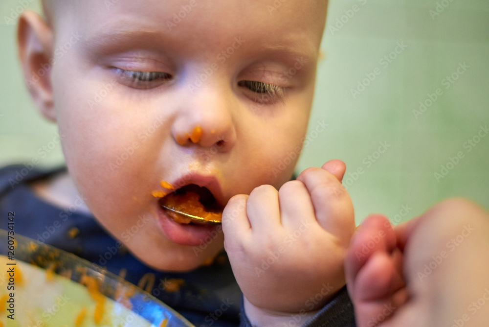 Little baby learn to eat by yourself with a spoon Little baby learn to eat by yourself with a spoon