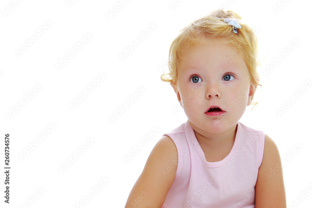Little girl posing in the studio. Close-up. Little girl posing in the studio. Close-up.