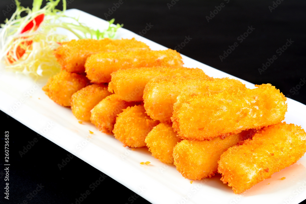 fried potatoes with sauce on plate fried potatoes with sauce on plate