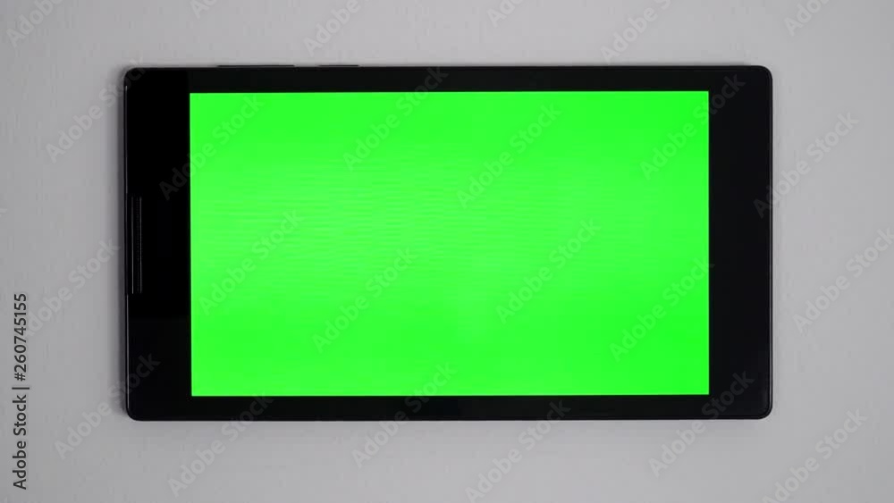 Smart home control device on a wall Smart home control device on a wall