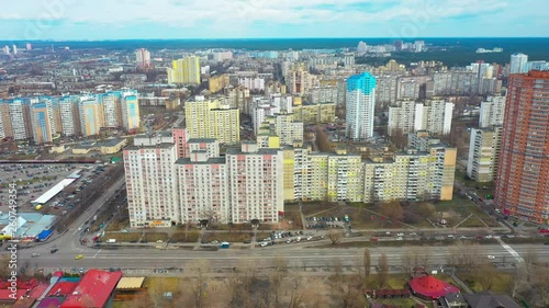 Fast aerial sidewards dolly, Kharkivskiy area in Kiev, Ukraine seen from above. photo