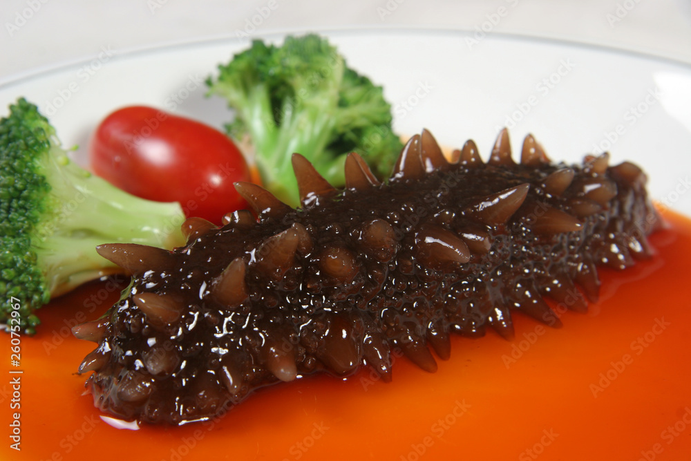 grilled sausage with sauce and vegetables