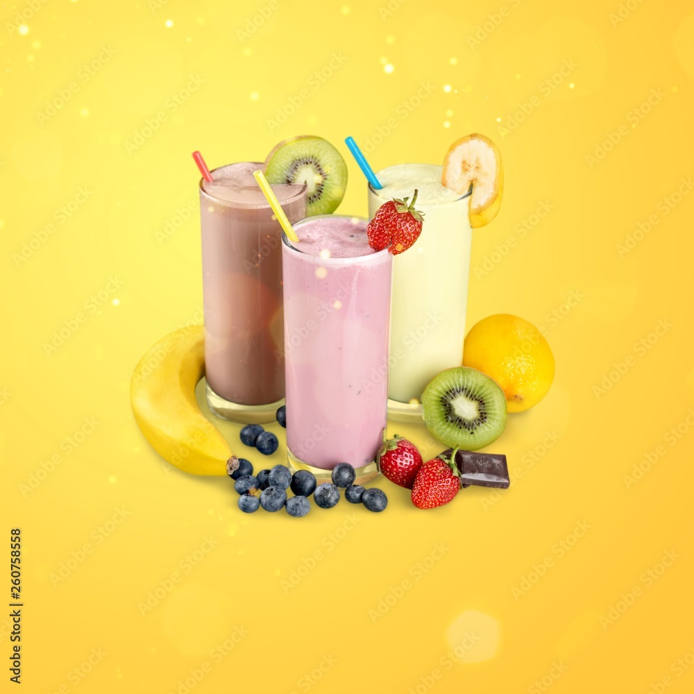 Fruit Smoothies with Straws Isolated on a White Background Fruit Smoothies with Straws Isolated on a White Background