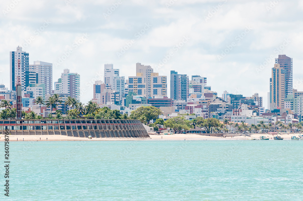 View of Praia de Tambau beach and the city on background at Joao Pessoa PB Brazil. Touristic beach of Brazilian northeast. View from the sea to the city.