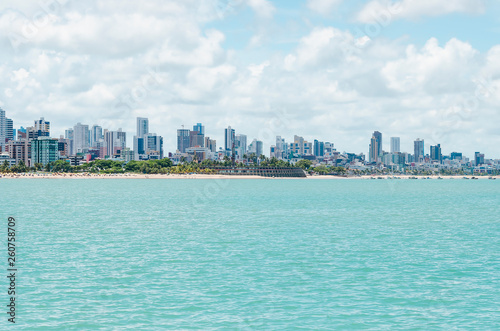 View of Praia de Tambau beach and the city on background at Joao Pessoa PB Brazil. Touristic beach of Brazilian northeast. View from the sea to the city.