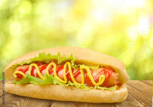 Barbecue Grilled Hot Dog with Yellow Mustard on white background