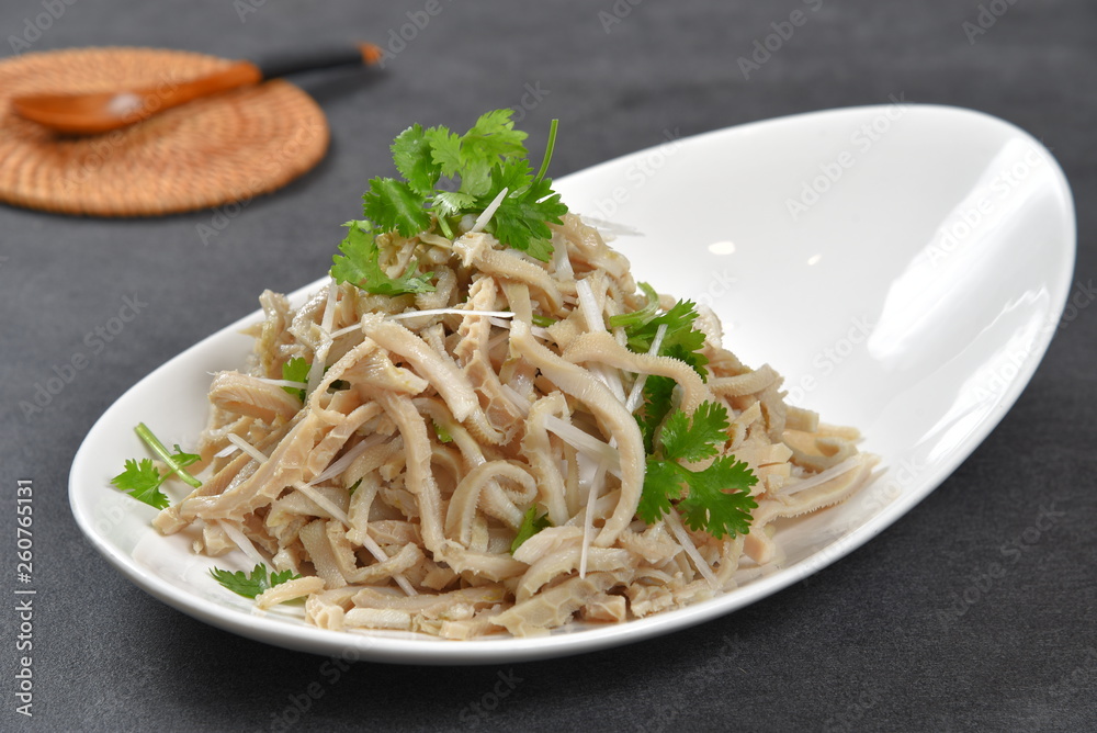 pasta with pesto sauce and basil