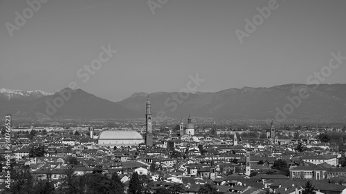 wide panorama of the city of Vicenza and the famous monument called Basilica Palladiana with the tall Clock Tower. Vicenza, Veneto, Italy - April 2019 © Piero