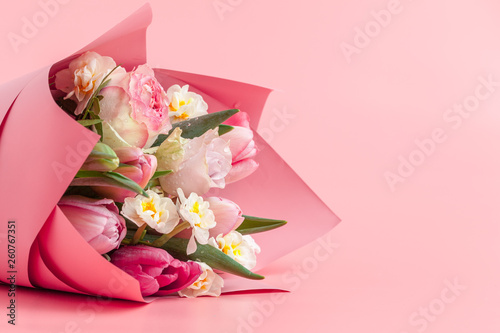 Pink flowers bouquet close up on color background