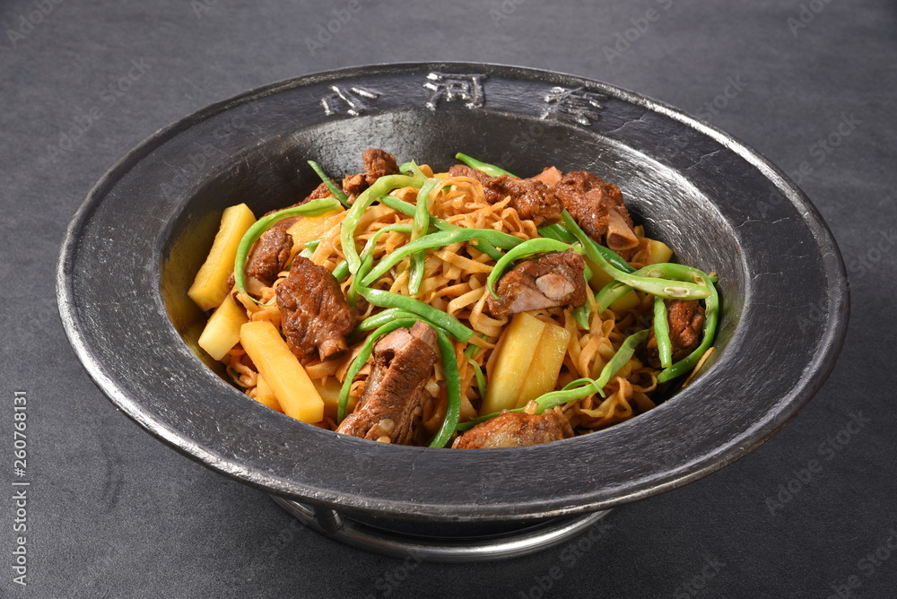 beef stew with vegetables and mushrooms in pan beef stew with vegetables and mushrooms in pan