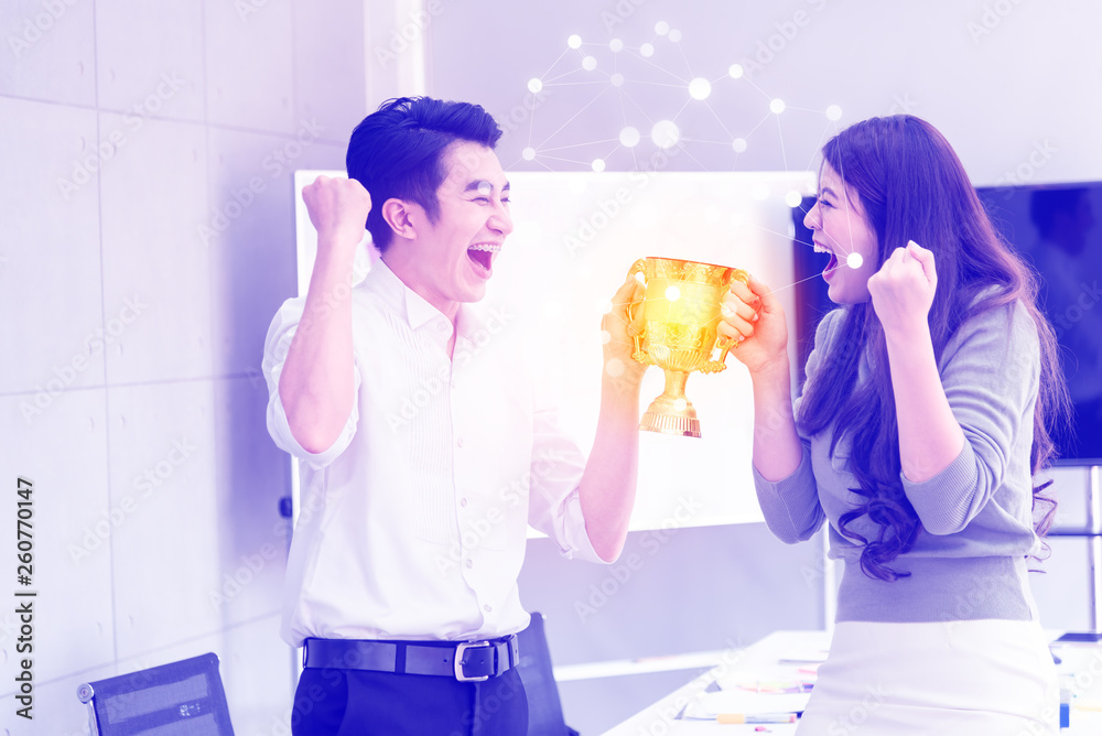 Young happiness asian smart business people holding gold trophy awards ...