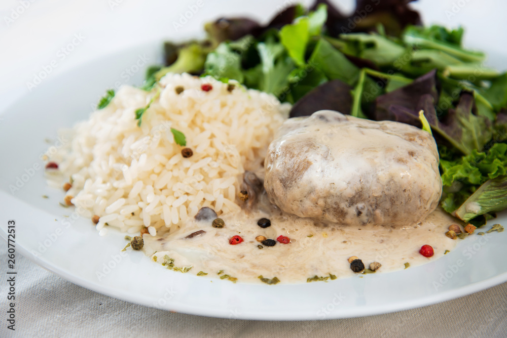 Veal Paupiette stewed with cream and rice Veal Paupiette stewed with cream and rice