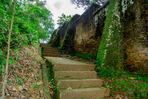 stairs covered by grass in behind Tomb of the Imogiri Kings on yogyakarta