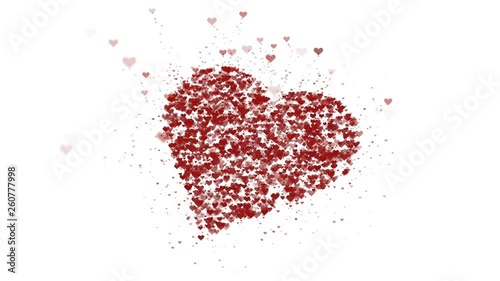 Red heart is isolated on white background. Accumulation of little hearts creates one large heart. The whole heart is being zoomed. Close up. Copy space.