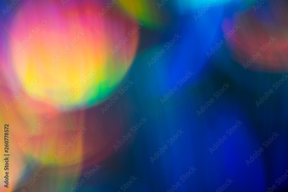 Blur colorful lens flare spots. Defocused abstract background. Bokeh Illuminated glow. Blur colorful lens flare spots. Defocused abstract background. Bokeh Illuminated glow.