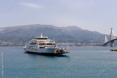A floating ship next to the city Rion (Greece) © TETYANA