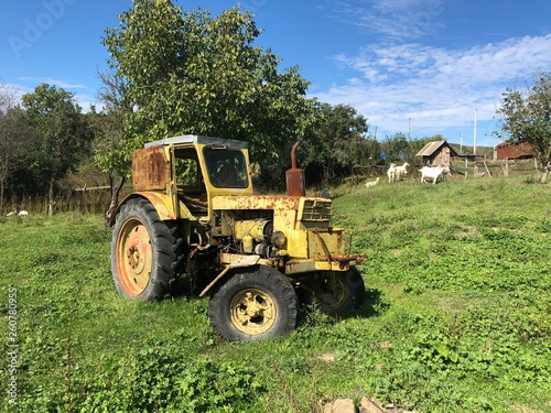 Rusty tractor at a farm