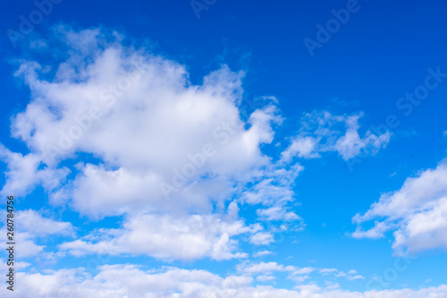 Sunshine clouds sky during morning background.  Blue white pastel heaven soft focus lens flare sunlight