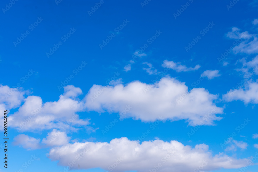 Sunshine clouds sky during morning background.  Blue,white pastel heaven,soft focus lens flare sunlight