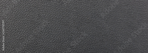 Black color natural leather background, banner, closeup