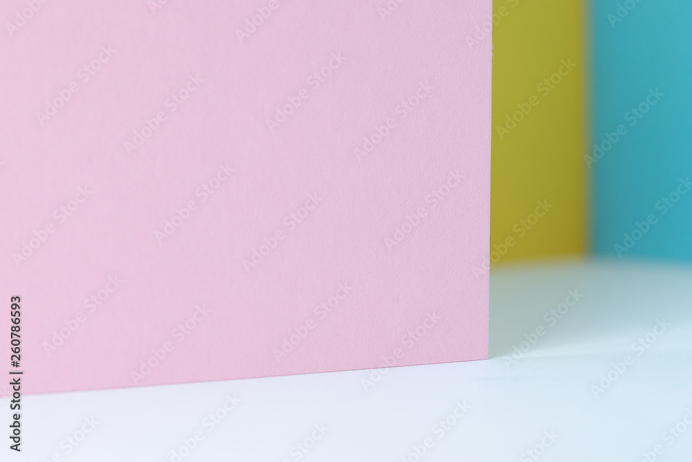 colored paper as fashion texture background in pastel color tone with shadow colored paper as fashion texture background in pastel color tone with shadow