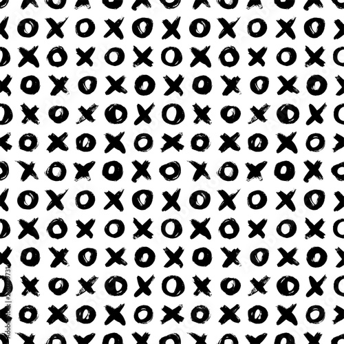 Vector seamless pattern with hand drawn noughts and crossess. Tile X O ink brush texture.
