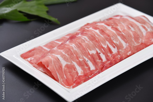 raw meat on wooden board