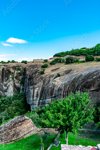 Metora - rock formation in central Greece. Beautiful scenery, sunny summer day with blue sky in the background. Touristic destination