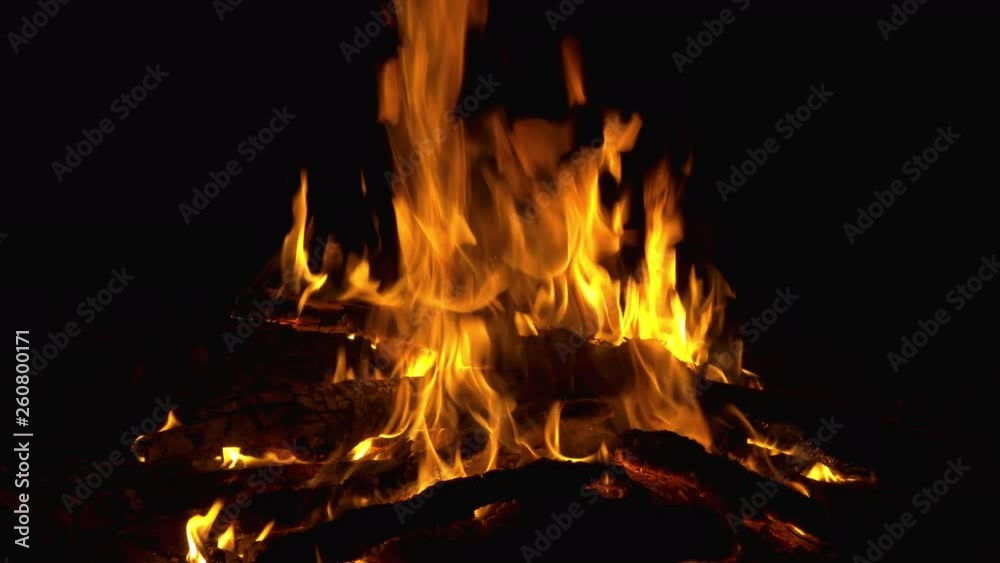 Close up of burning firewood in a fire. camping. rural life. fire in the fireplace Close up of burning firewood in a fire. camping. rural life. fire in the fireplace