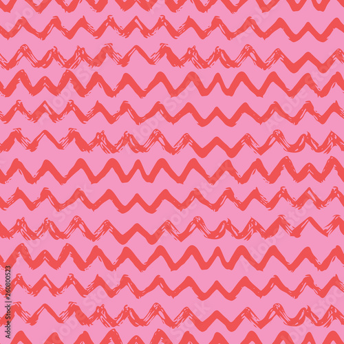 Seamless pattern. Chevron, a zigzag ornament in pink, red colors. Pritn for textiles, wallpapers, scrapbooking in doodle style. Vector illustration.
