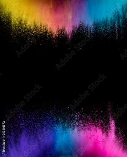 Explosion of colored powder isolated on black © Jag_cz