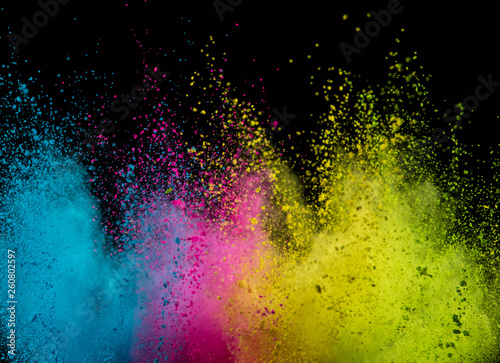 Explosion of colored powder isolated on black