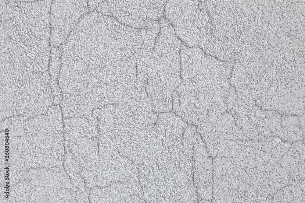 Wet cracks in the cement surface Wet cracks in the cement surface
