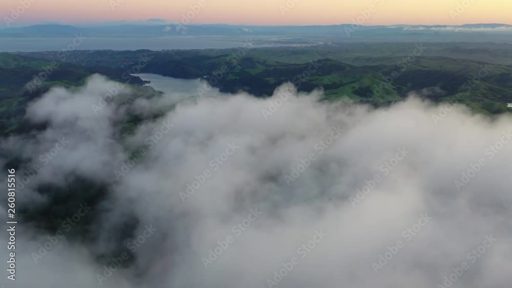 Clouds drift over the East Bay hills in the San Francisco Bay area of California. Clouds drift over the East Bay hills in the San Francisco Bay area of California.