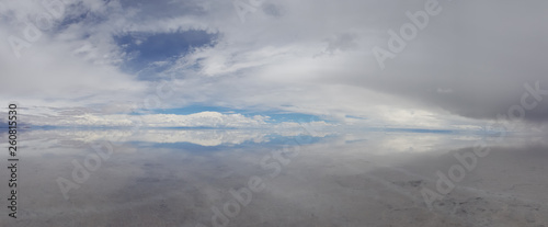 The Salar de Uyuni flooded after the rains  Bolivia. Clouds reflected in the water of the Salar de Uyuni  Bolivia