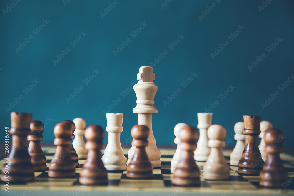 chess on board on dark background chess on board on dark background