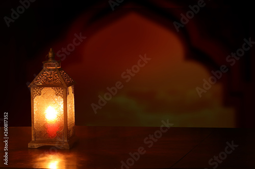 Ramadan Kareem background.Ramadan lantern on wooden  table