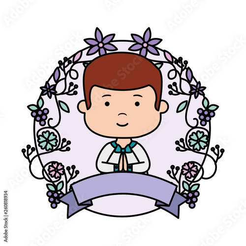 little boy with wreath flowers first communion