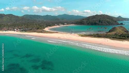 Flight over beautiful empty beach