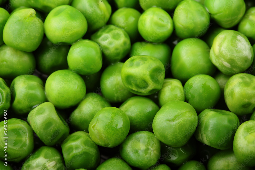 Fresh green peas background texture top view.Full depth focus. Fresh green peas background texture top view.Full depth focus.