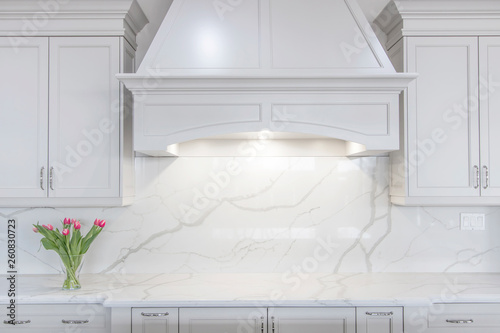 Tableau sur toile A modern white kitchen with a traditional touch