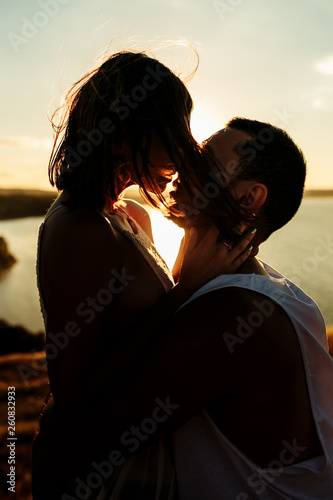 Close up portrait of a beautiful young couple waiting to kiss in their traveling time