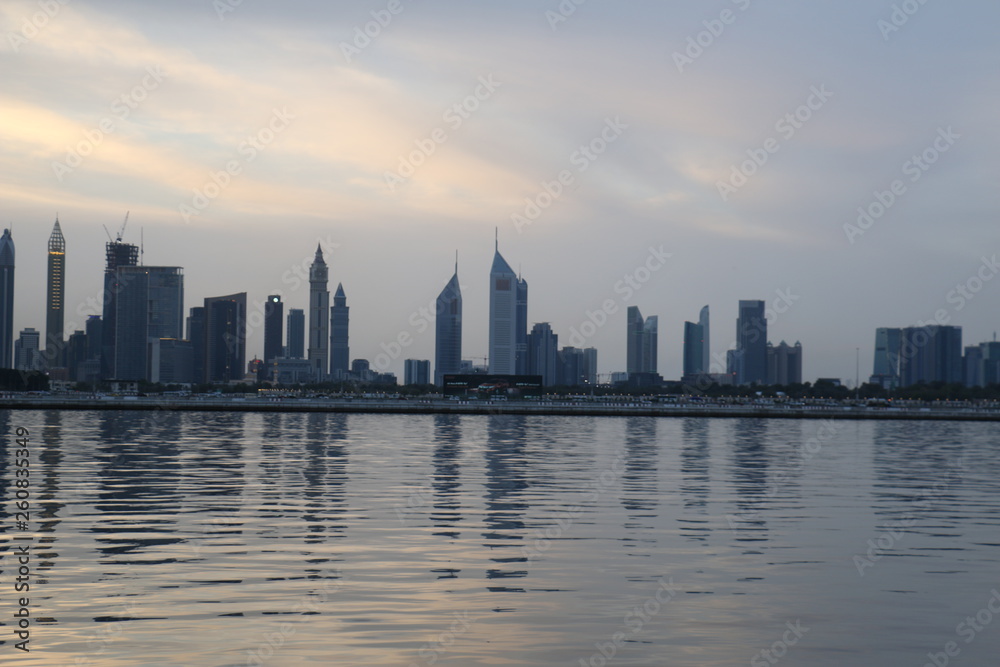 Dubai Skyline under Cloudy Sky, Dubai Downtown Residential and Business Skyscrapers, a view from Dubai Water Canal, Dubai, United Arab Emirates