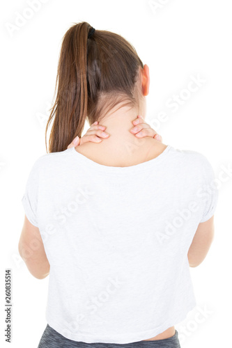 Closeup view tired slim young woman female massaging her neck