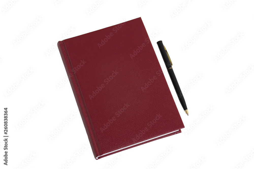 The burgundy notebook and black pen lie on a white table. The burgundy notebook and black pen lie on a white table.